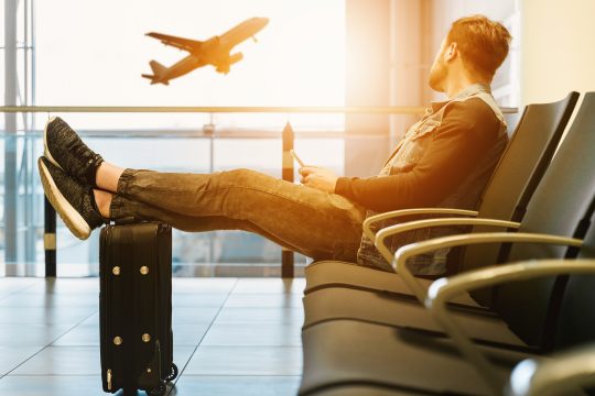 man delayed in waiting area while flight leaving